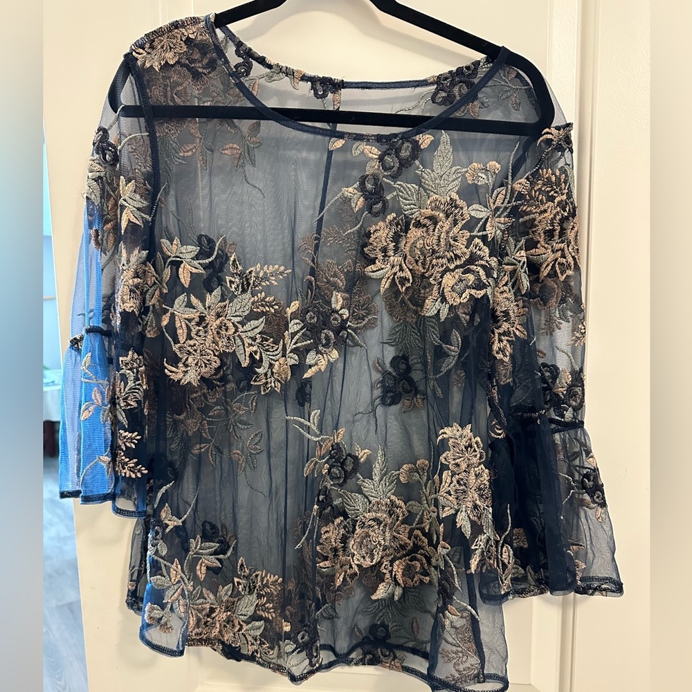 Stunning sheer navy top. Size large.